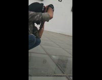 Woman blue floral tank top photo shoot