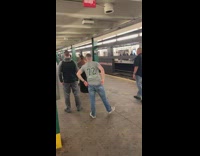Three guys confront shirtless dancing guy with knife in subway train