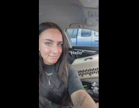 Girl says hey and cat inside of cage says hello