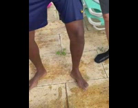 Man screams from the lizard behind his slippers