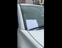 Angry note on car with weird noise