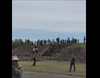 Man and Woman high five jump shot with flute music