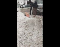 Girl throws blow up doll on snow 