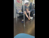 Woman shaves legs on train
