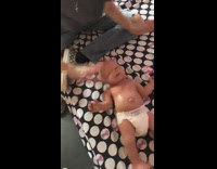 Guy slaps baby doll head 
