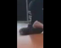 Person attempts backflip on trampoline hits face