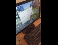 Filmer explains and shows his computer setup