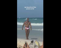 buff man pink underwear beach