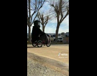 Collab ClipsIG - Man Picks Up Helmet and Rides Kids Bike