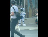 Girl wear astronaut costume dance on street