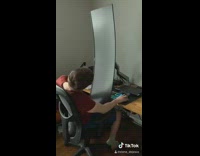 Red shirt guy long vertical computer screen 