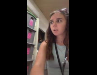 Girl blue shirt pink shorts skit fighting lanyard