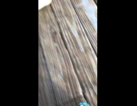 Boy rides skateboard on slide then falls