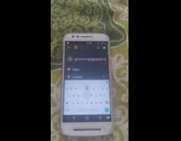 Phone on the bed glitches and types letters randomly