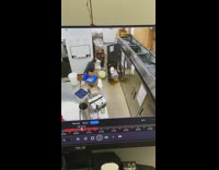 Girl spills brown liquid from container 