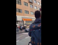 Long line of people outside  Spirit Halloween store