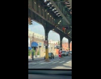 Man Santa Claus costume rides the skateboard