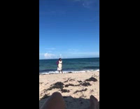 Girl white dress stretch arms beach windy part 1
