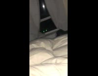 Girl records two bears outside her open window