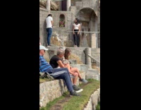 Woman theatre photoshoot with live performance nearby