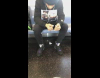 Guy wears shirts with women in thongs on subway train