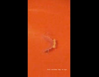 Retainer denture with teeth left on orange subway seat