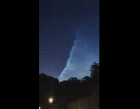 Clouds separated in light and dark at the sky