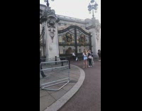 Woman and a girl photo shoot big black gate