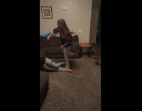 Couple plays together stretches legs to stand