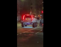 White Van Seen with Skyscraper Wheels 