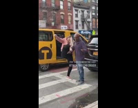 Woman starts a fight with taxi driver and undercover police officer on the street