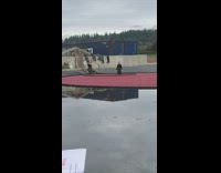 Guy throws handful of cranberries black shirt