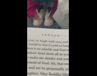 Granny Browses Phone with Feet Out of Shoes