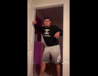 Guy wearing black sweater does silhouette challenge 