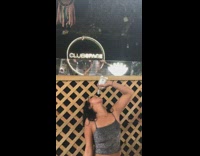 Girl day club trying to get last drop of alcohol bottle