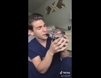 Kitten pees on carpet climbs on back