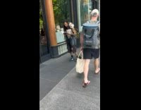 Collab WINY - Cat sits on shoulder of man with dreadlocks braided hair