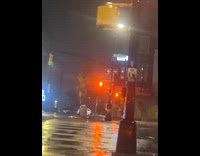 Car flipped upside down middle of intersection