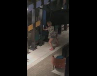 Woman alone tiktok dance alone in hotel common area