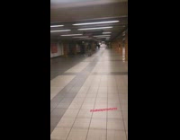 Man skating through subway station