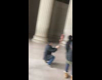 Girl sexy pose near lincoln statue column