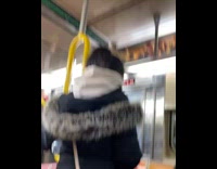 Condom stuck to ceiling of subway