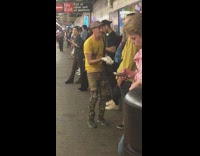 Collab Subway Creatures - Guy points and sings to man in yellow jacket and friend subway train