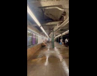 Water leaks from ceiling of subway station