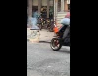 Collab WINY - Woman burn garbage in trash can street