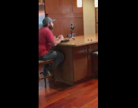 Man selfie video eat ring light kitchen