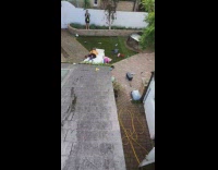 Orange jacket guy skis off roof