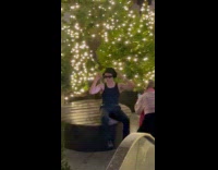 Man tank top front of Christmas Tree