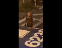 Guy scary costume mask blue bus crosswalk 