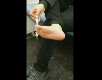 man in black outfit ointment on feet